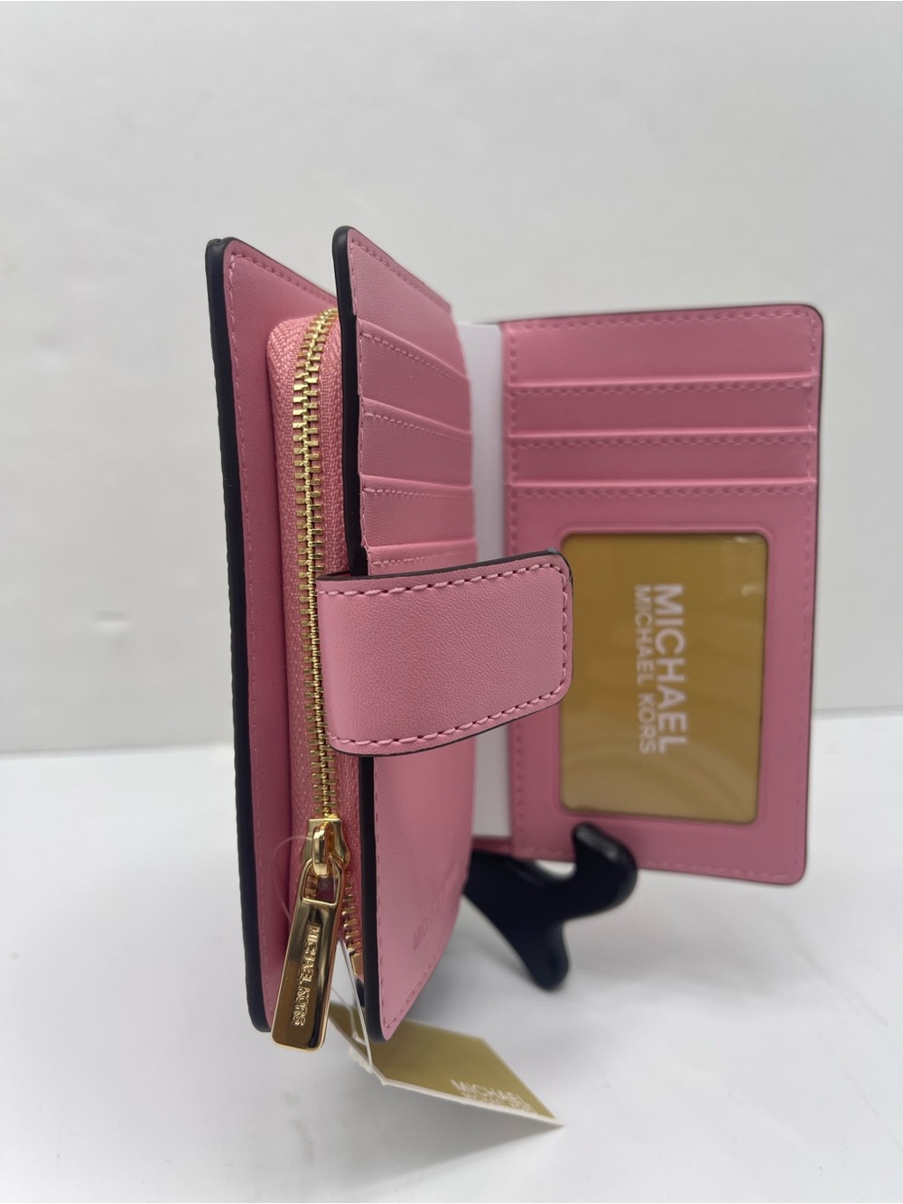 Michael KORS Jet Set Travel Md Zip CN Logo Debossed Bifold Wallet
Carnation 
NWT - Picture 8 of 16